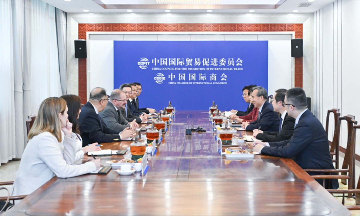 Ren Hongbin, chairman of the China Council for the Promotion of International Trade (CCPIT), meets with Cristiano Amon, president and CEO of Qualcomm in Beijing on May 15, 2026. Photo: Screenshot from the CCPIT