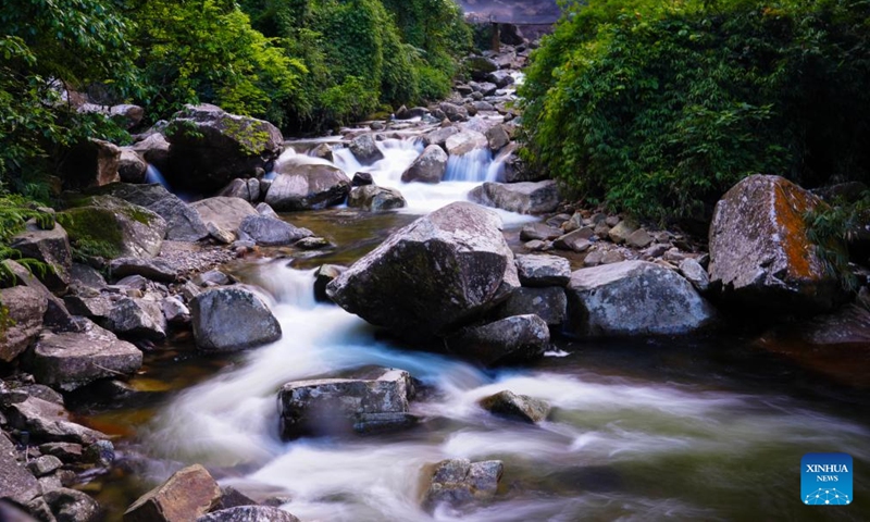 This photo shows a view of the Ladeng waterfall scenic area in Jinping Miao, Yao and Dai Autonomous County, southwest China's Yunnan Province, May 13, 2026. In early summer, the waterfall clusters in Jinping attracted many tourists. (Xinhua/Chen Xinbo)