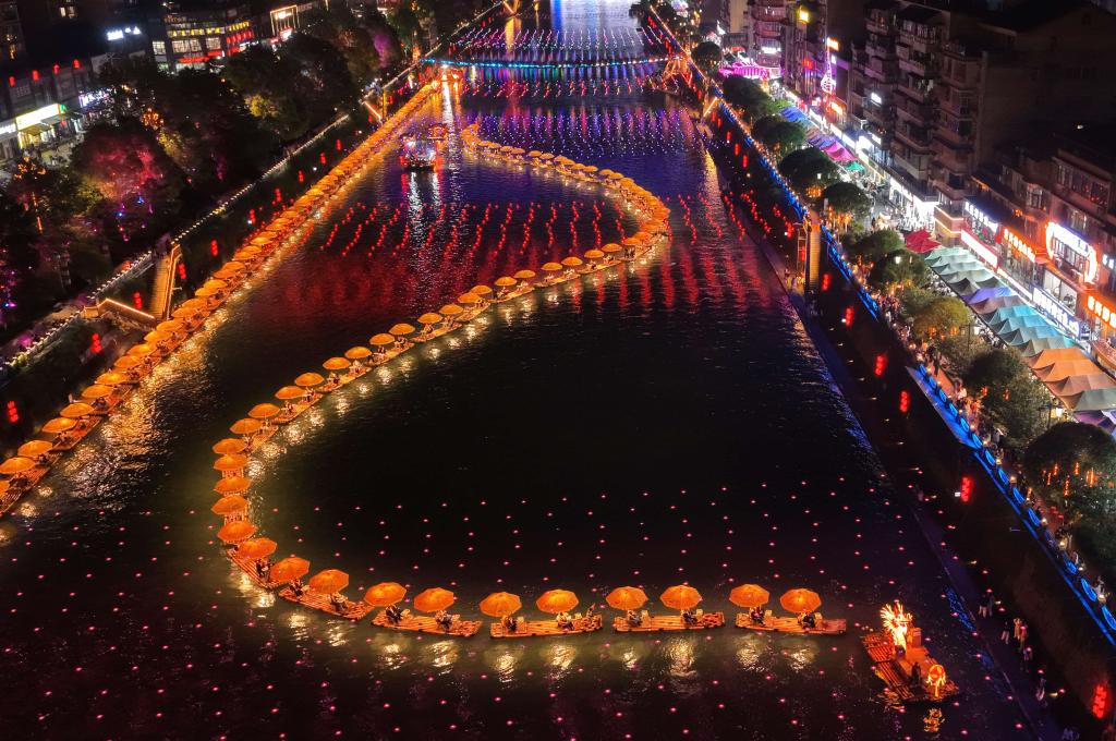 A drone photo taken on May 2, 2026 shows tourists taking bamboo rafts in Xuanen County of Enshi Tujia and Miao Autonomous Prefecture, central China's Hubei Province. (Photo: Xinhua)