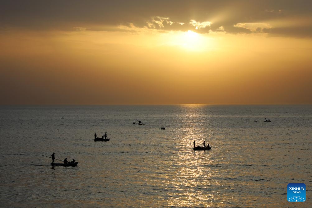 This photo taken on May 14, 2026 shows Palestinian fishermen seen near the seashore west of the Gaza City. (Photo: Xinhua)