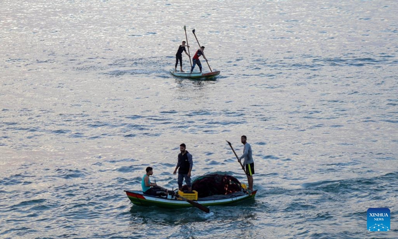 This photo taken on May 14, 2026 shows Palestinian fishermen seen near the seashore west of the Gaza City. (Photo: Xinhua)