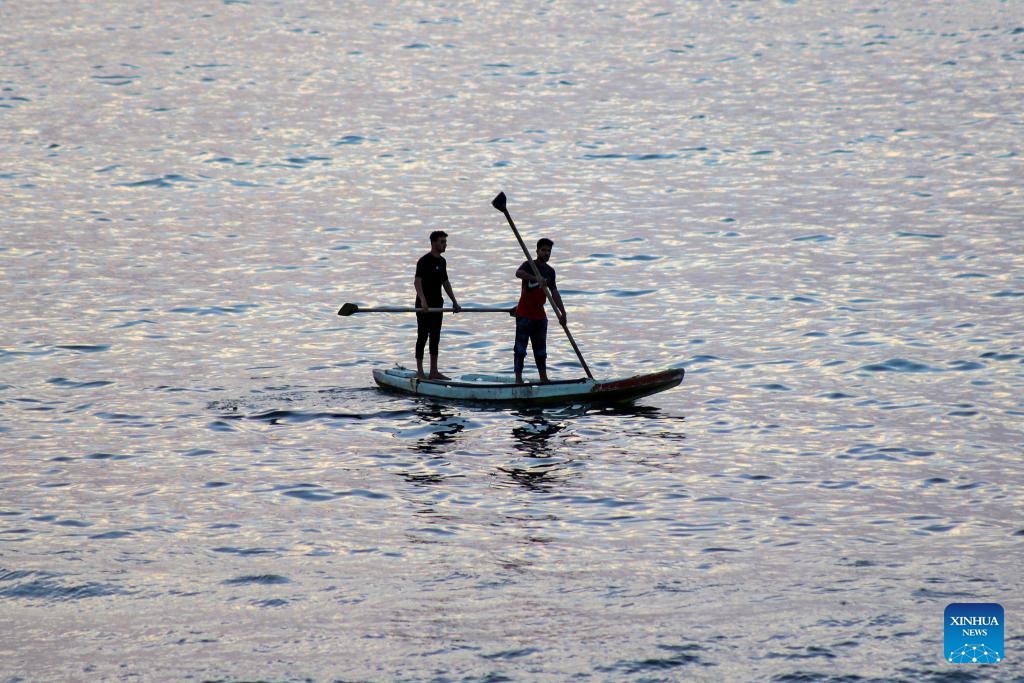 This photo taken on May 14, 2026 shows Palestinian fishermen seen near the seashore west of the Gaza City. (Photo: Xinhua)