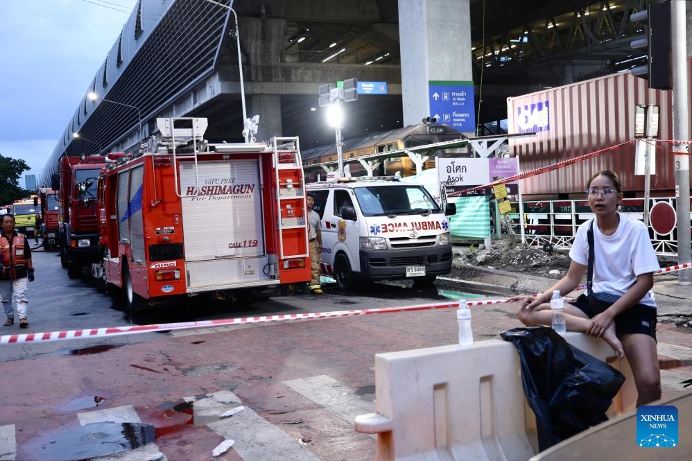 Cordons are seen near the site of a train-bus collision in Bangkok, Thailand, May 16, 2026. A train and a bus collided in Bangkok, Thailand, on Saturday afternoon, killing eight people, local media reported. At around 3:40 p.m., a train collided with a bus at a railway crossing in Ratchathewi District, triggering a fire accompanied by an explosion. Several other cars and motorcycles were also involved. More than 20 people were injured, according to local media, as rescuers rushed to the scene to put out the fire and carry out rescue operations. (Photo: Xinhua)