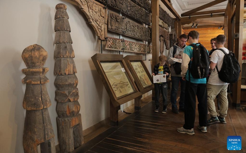 Visitors view traditional architecture exhibits at the Russian Museum of Ethnography in St. Petersburg, Russia, May 16, 2026. During the Night of Museums, an event held from May 16 to 17 in Russia, more than 140 museums, galleries, libraries, exhibition halls and concert halls stay open from evening till night, to mark the upcoming International Museum Day, observed globally on May 18. (Photo by Irina Motina/Xinhua)