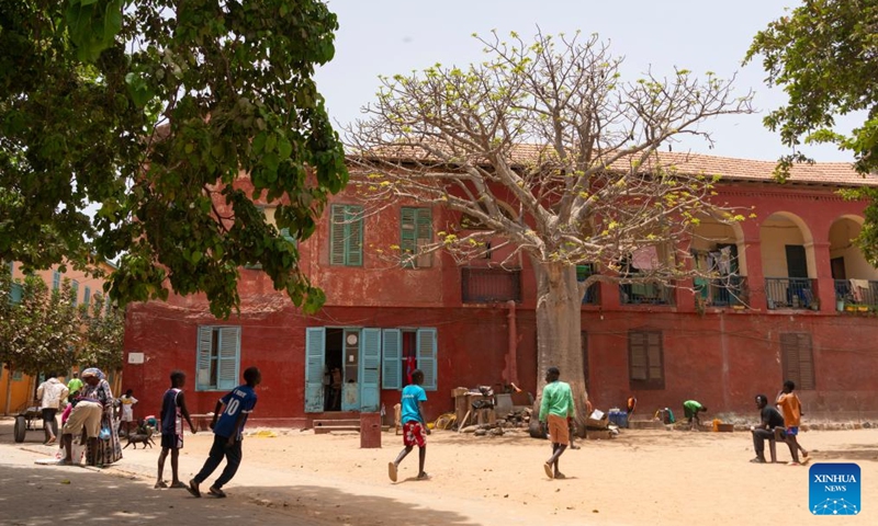 Children play on Goree Island in Senegal on May 16, 2026. Goree Island lies off the coast of Senegal, opposite Dakar. Ruled in succession by the Portuguese, Dutch, English and French, it was the largest slave-trading center on the African coast from the 15th to the 19th century. (Xinhua/Xie Jianfei)
