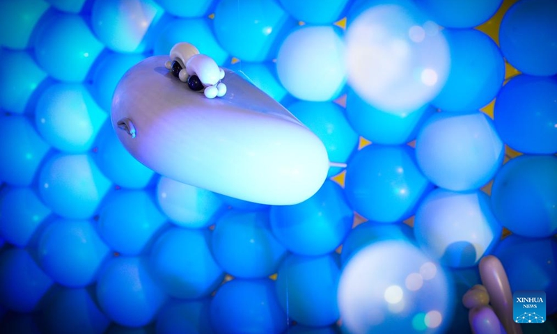 A marine life-themed balloon installation is seen during the World Balloon Festival in Warsaw, Poland, May 15, 2026. The festival takes place here from May 15 to 17, featuring large themed installations featuring tropical jungles, underwater world, outer space and architectural landmarks created with more than 100,000 biodegradable balloons. (Photo by Jaap Arriens/Xinhua)