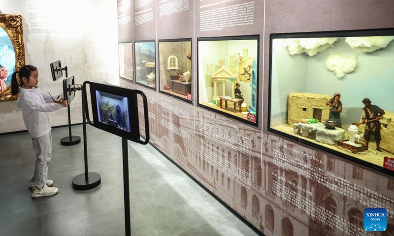 A kid visits an ice cream museum in Shenyang, northeast China's Liaoning Province, May 16, 2026. There are several food-themed museums in Shenyang, Liaoning Province, among which the ice cream museum is a notable example.

Located in Dadong District of Shenyang, the museum covers an area of approximately 6,000 square meters that accommodates 11 major themed zones.

In addition to displaying vintage, time-honored ice cream making machines, it also offers visitors hands-on ice cream making experiences. Blending both recreational fun and educational value, it has become a well-loved destination for tourists. Photo: Xinhua