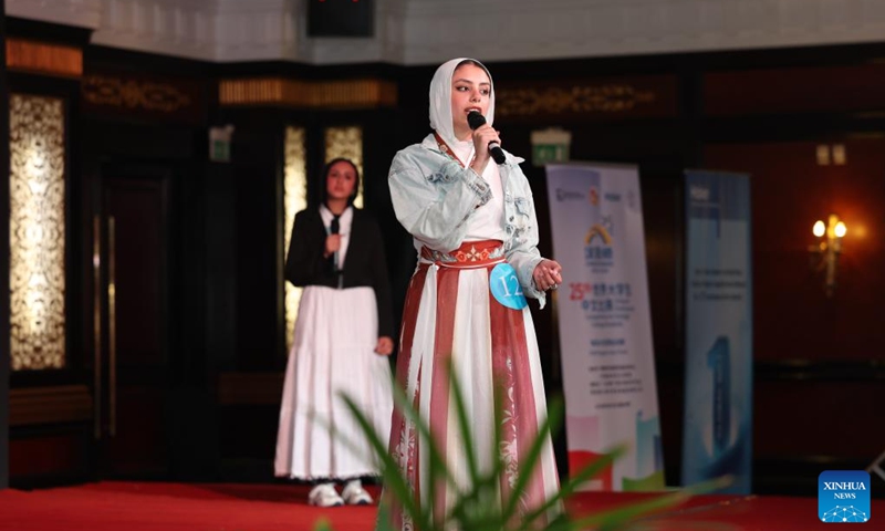 A contestant competes during the final of the 25th Chinese Bridge Chinese Proficiency Competition for Foreign College Students in Cairo, Egypt, May 15, 2026. The final of the 25th Chinese Bridge Chinese Proficiency Competition for Foreign College Students in Egypt was held here on Friday evening, with the attendance of 14 students majoring in Chinese.
The finalists advanced from a pool of 26 contestants representing 14 Egyptian universities in the preliminary rounds. Photo: Xinhua