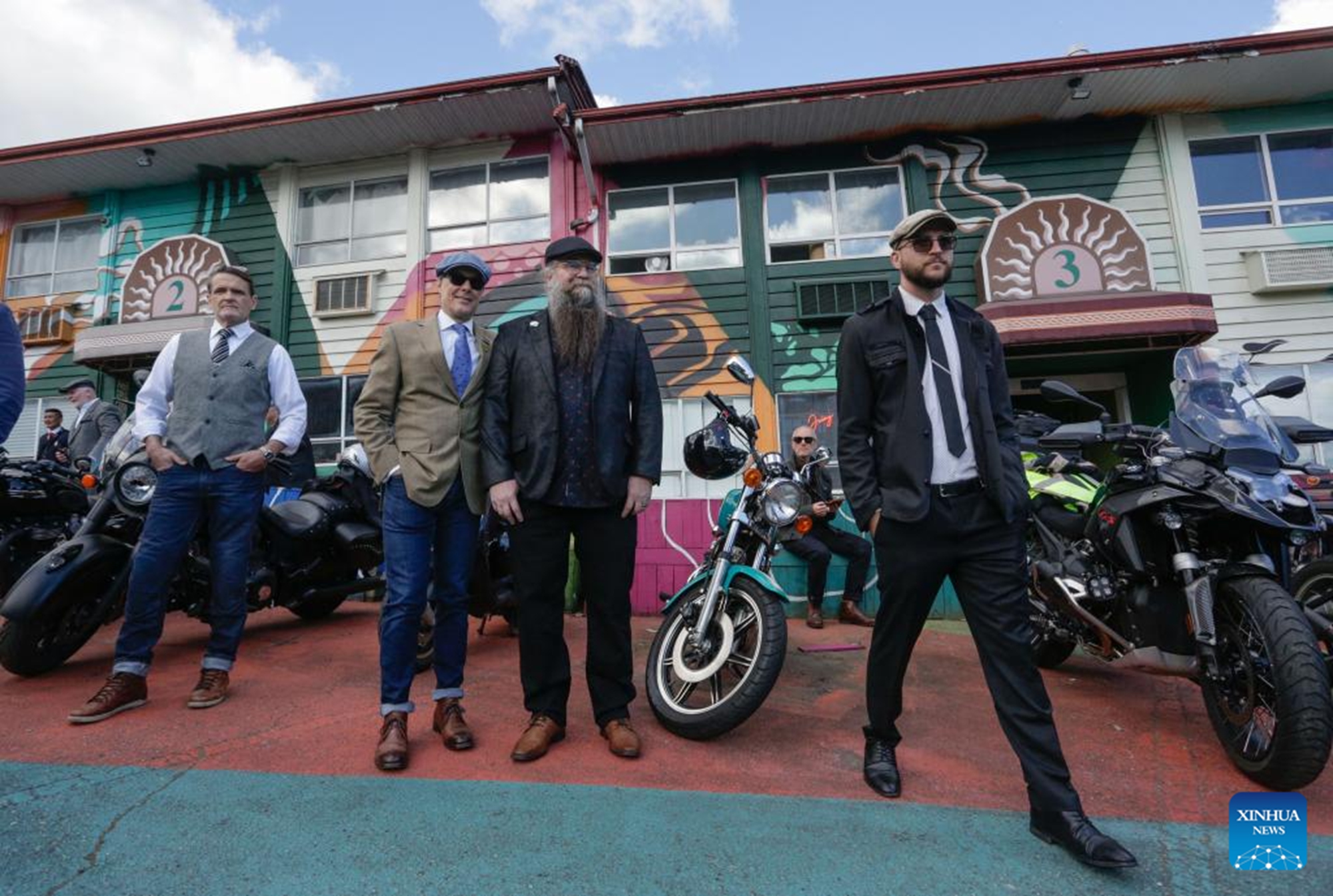 Riders in vintage attire take part in the 2026 Distinguished Gentleman's Ride in Vancouver, British Columbia, Canada, on May 17, 2026. The annual event was held in many cities across Canada on Sunday to raise funds and awareness for men's health, attracting more than 300 dapper riders. (Photo by Liang Sen/Xinhua)