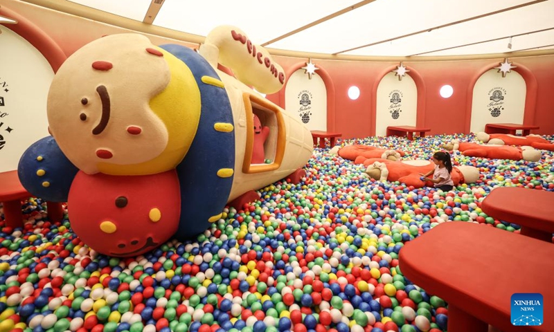 A kid has fun at an ice cream museum in Shenyang, northeast China's Liaoning Province, May 16, 2026. There are several food-themed museums in Shenyang, Liaoning Province, among which the ice cream museum is a notable example.

Located in Dadong District of Shenyang, the museum covers an area of approximately 6,000 square meters that accommodates 11 major themed zones.

In addition to displaying vintage, time-honored ice cream making machines, it also offers visitors hands-on ice cream making experiences. Blending both recreational fun and educational value, it has become a well-loved destination for tourists. Photo: Xinhua