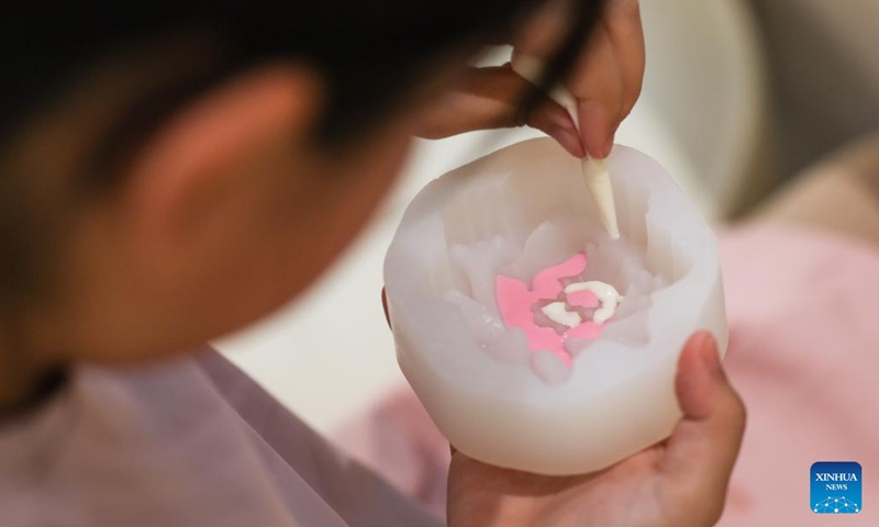 A kid tries to make ice cream at an ice cream museum in Shenyang, northeast China's Liaoning Province, May 16, 2026. There are several food-themed museums in Shenyang, Liaoning Province, among which the ice cream museum is a notable example.

Located in Dadong District of Shenyang, the museum covers an area of approximately 6,000 square meters that accommodates 11 major themed zones.

In addition to displaying vintage, time-honored ice cream making machines, it also offers visitors hands-on ice cream making experiences. Blending both recreational fun and educational value, it has become a well-loved destination for tourists. Photo: Xinhua