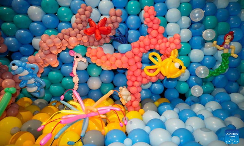 Marine life-themed balloon installations are seen during the World Balloon Festival in Warsaw, Poland, May 15, 2026. The festival takes place here from May 15 to 17, featuring large themed installations featuring tropical jungles, underwater world, outer space and architectural landmarks created with more than 100,000 biodegradable balloons. (Photo by Jaap Arriens/Xinhua)