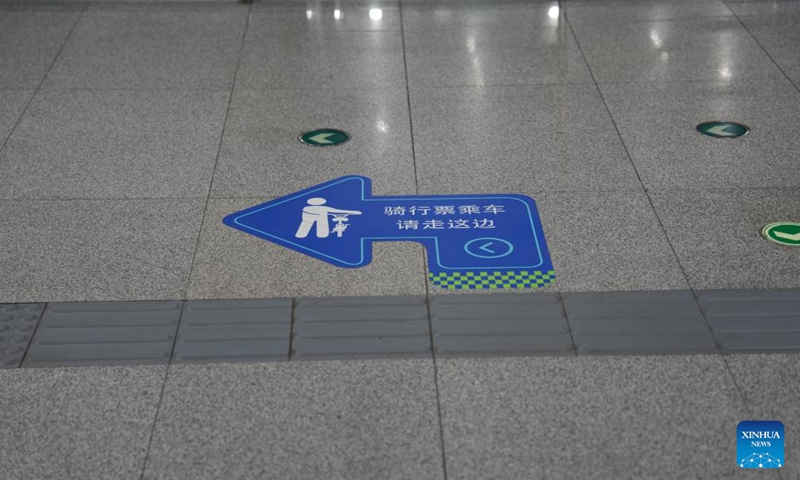 This photo taken on May 16, 2026 shows a sign guiding passengers using bike tickets at Jin'anqiao Station of Beijing Subway in Beijing, capital of China. Beijing launched a pilot service on May 10 that allows passengers to bring their bicycles onto the subway train, as the number of cycling enthusiasts and demand for cross-district rides grow in the capital.

According to the Beijing Municipal Commission of Transport, starting May 10, passengers can bring single-seat, human-powered two-wheel bicycles with a wheel diameter of up to 28 inches (about 71 cm) onto subway trains at 11 pilot stations across four lines, namely Line 6, Line 17, the Changping Line and the S1 Line. Photo: Xinhua