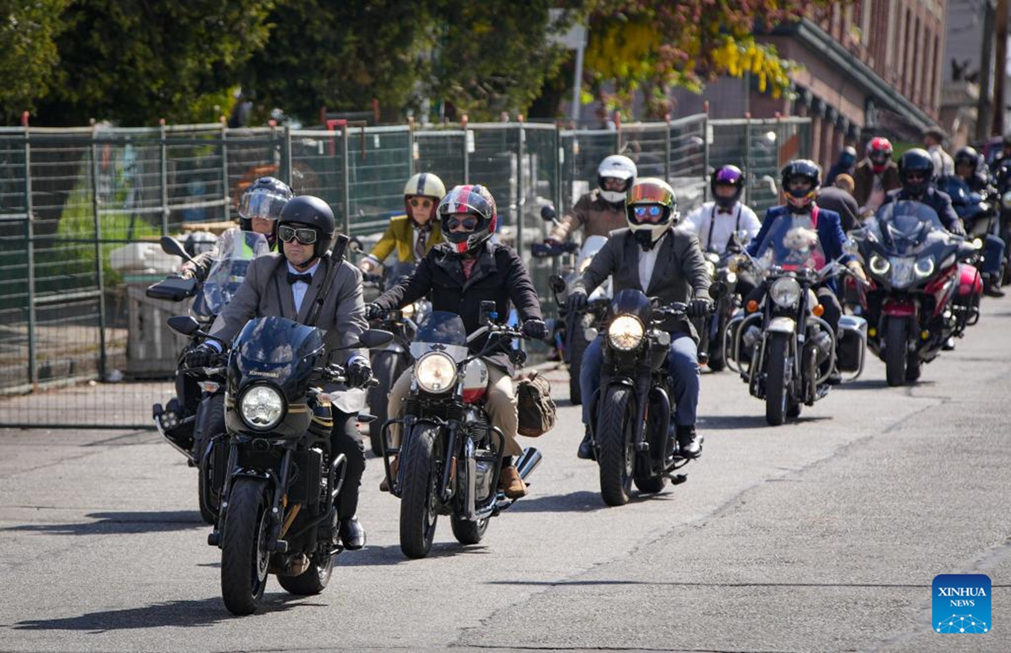 Riders in vintage attire take part in the 2026 Distinguished Gentleman's Ride in Vancouver, British Columbia, Canada, on May 17, 2026. The annual event was held in many cities across Canada on Sunday to raise funds and awareness for men's health, attracting more than 300 dapper riders. (Photo by Liang Sen/Xinhua)