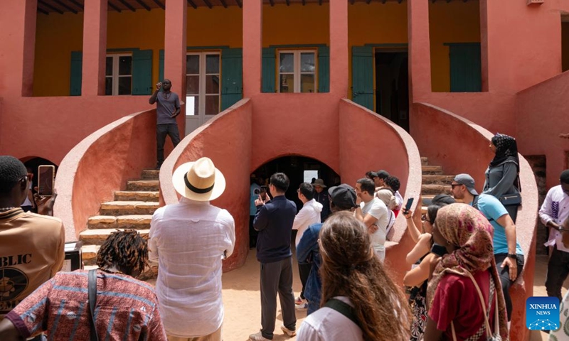 Tourists visit the House of Slave on Goree Island in Senegal, May 16, 2026. Goree Island lies off the coast of Senegal, opposite Dakar. Ruled in succession by the Portuguese, Dutch, English and French, it was the largest slave-trading center on the African coast from the 15th to the 19th century. (Xinhua/Xie Jianfei)