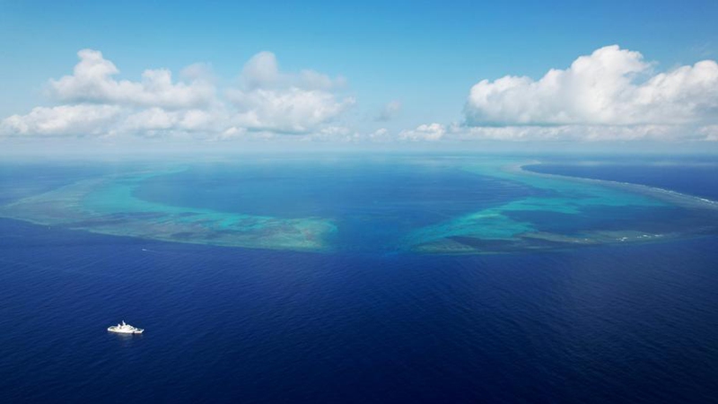 An aerial drone photo taken on May 12, 2026 shows the China Coast Guard (CCG) vessel Chuanshan patrolling in the territorial waters of China's Huangyan Dao in the South China Sea. (Xinhua/Chen Bin)