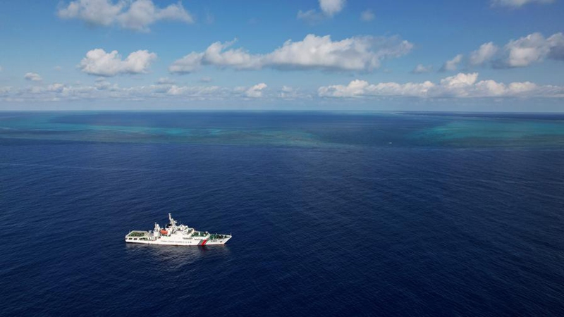 An aerial drone photo taken on May 12, 2026 shows the China Coast Guard (CCG) vessel Chuanshan patrolling in the territorial waters of China's Huangyan Dao in the South China Sea. (Xinhua/Chen Bin)
