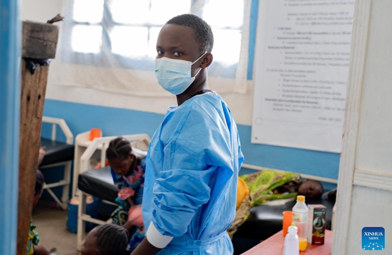 A health worker wearing a mask is seen at the general reference hospital in Rwampara in eastern Democratic Republic of the Congo, on May 16, 2026. The death toll from the latest Ebola outbreak in the Democratic Republic of the Congo (DRC) has risen to 87, the Africa Centers for Disease Control and Prevention (Africa CDC) said Saturday, warning that the outbreak is driven by the Bundibugyo strain, for which no strain-specific vaccine is currently available, and that it carries a high risk of regional spread. (Str/Xinhua)
