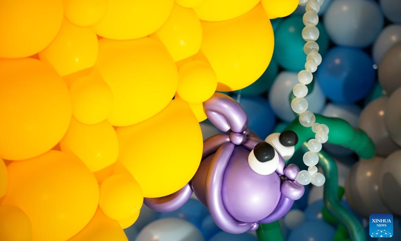 A fish-themed balloon installation is seen during the World Balloon Festival in Warsaw, Poland, May 15, 2026. The festival takes place here from May 15 to 17, featuring large themed installations featuring tropical jungles, underwater world, outer space and architectural landmarks created with more than 100,000 biodegradable balloons. (Photo by Jaap Arriens/Xinhua)