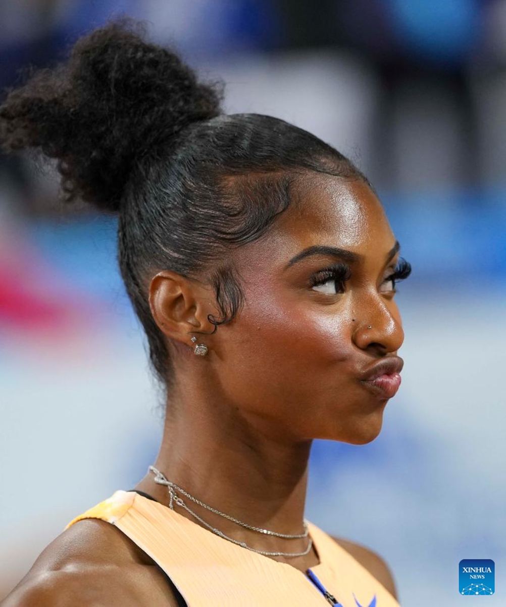 Masai Russell of the United States reacts after the women's 100m hurdles final at the Yangtze River Delta Athletics Diamond Gala in Shaoxing, east China's Zhejiang Province, May 16, 2026. (Xinhua/Luo Yuan)