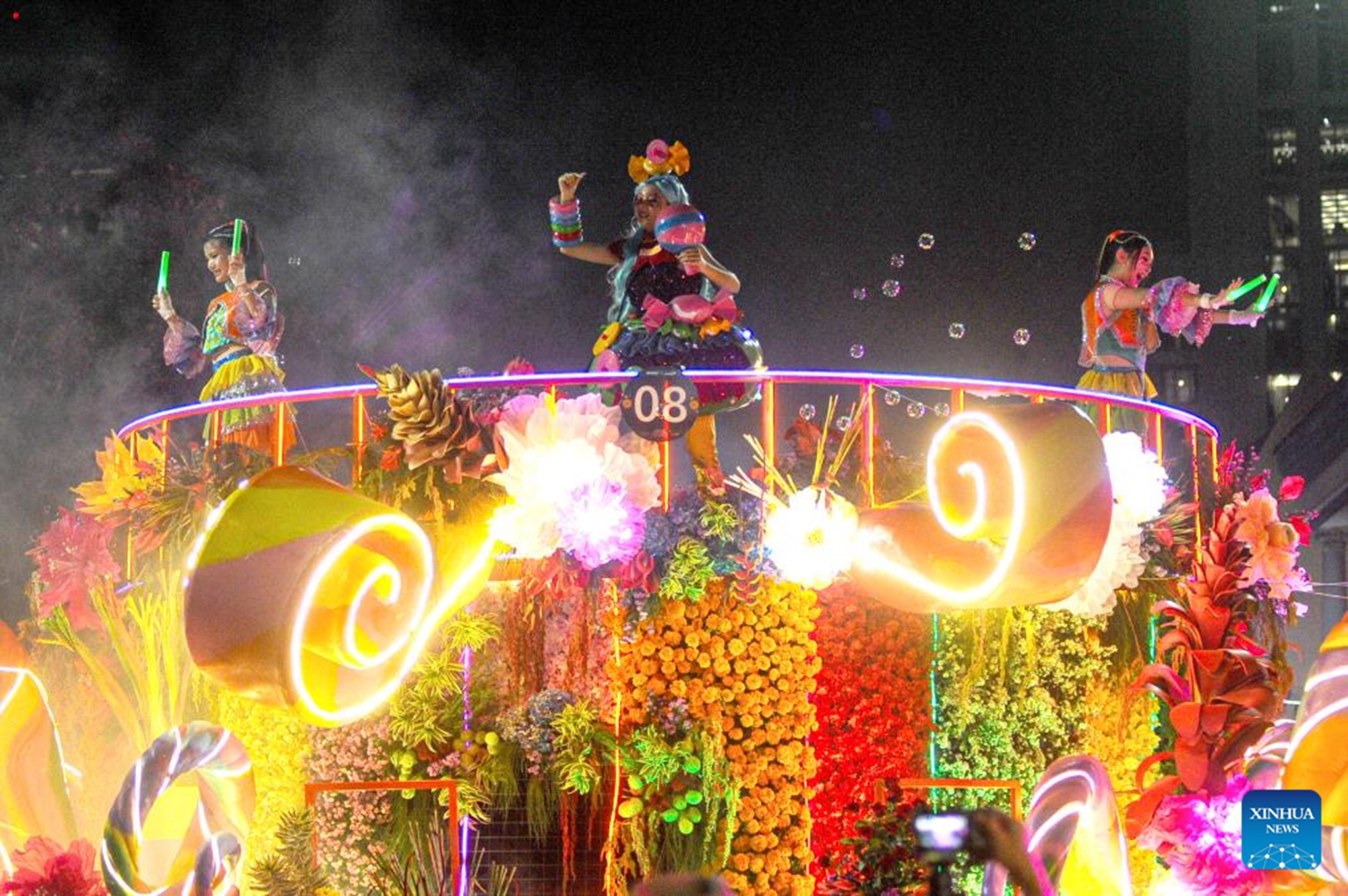 Performers take part in the Surabaya Vaganza 2026 in Surabaya, East Java province, Indonesia on May 16, 2026. Themed Garden of Hope, the Surabaya Vaganza 2026 presented decorated floats, light displays and cultural performances to showcase local culture and positive spirits in Surabaya. (Photo by Sahlan Kurniawan/Xinhua)

