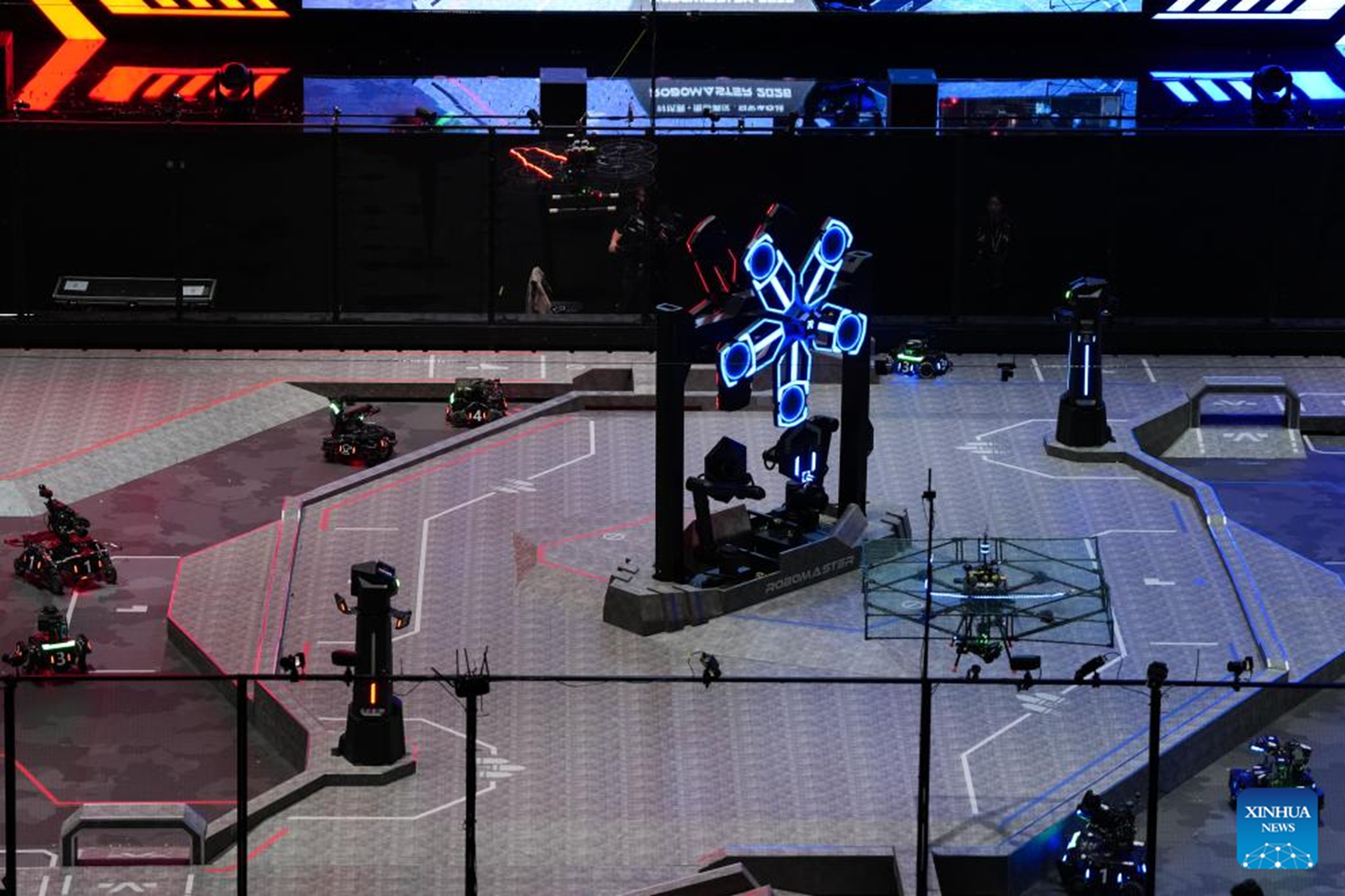 Contestants from South China Agricultural University test their robots during the RoboMaster 2026 University Championship Regional Competition in Changsha, central China's Hunan Province, May 17, 2026. The five-day regional competition concluded here on Sunday, with team Taurus from South China Agricultural University winning the first place. The competition attracted teams from 32 universities of China. (Xinhua/Chen Zhenhai)