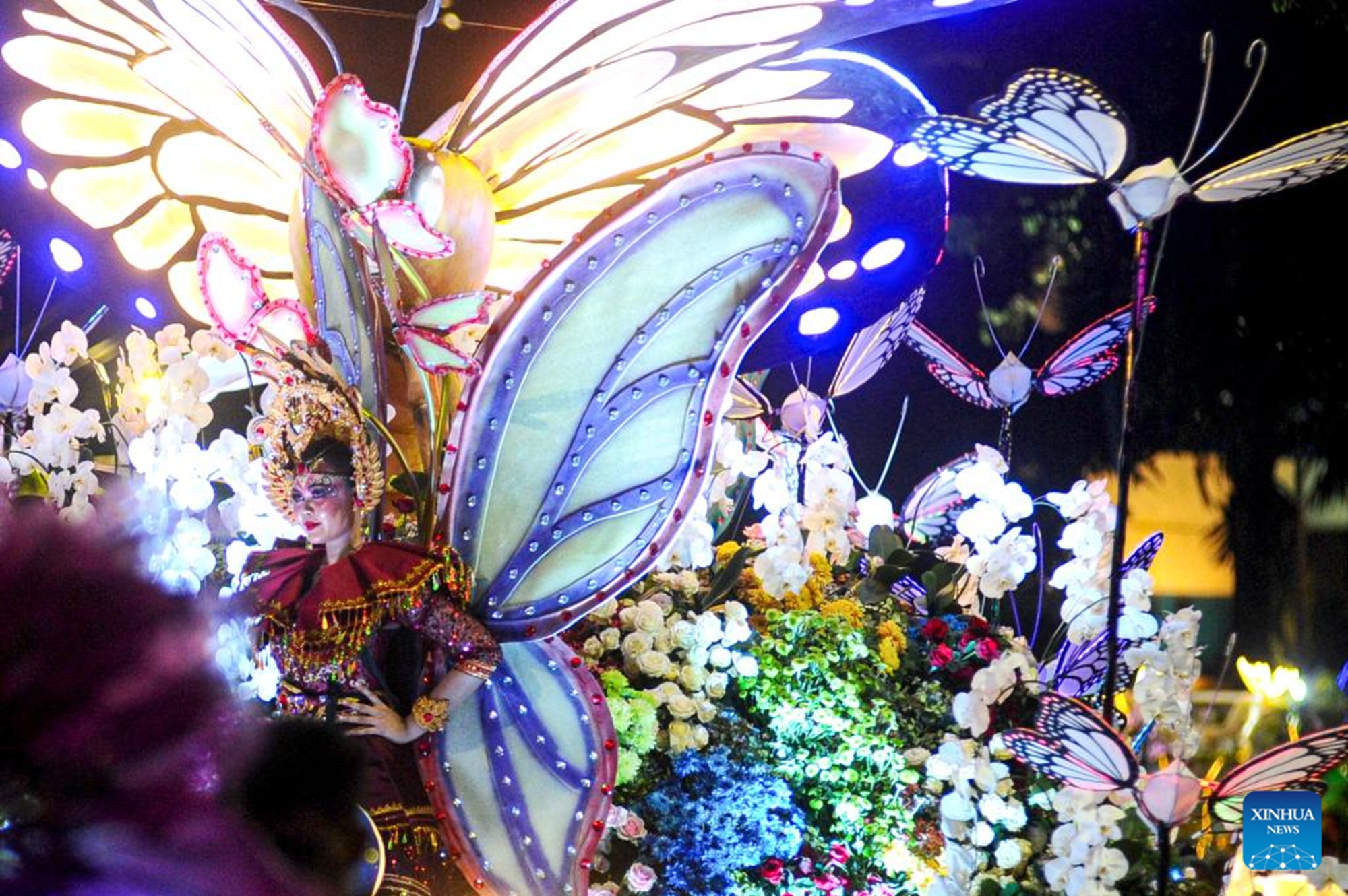 Performers take part in the Surabaya Vaganza 2026 in Surabaya, East Java province, Indonesia on May 16, 2026. Themed Garden of Hope, the Surabaya Vaganza 2026 presented decorated floats, light displays and cultural performances to showcase local culture and positive spirits in Surabaya. (Photo by Sahlan Kurniawan/Xinhua)

