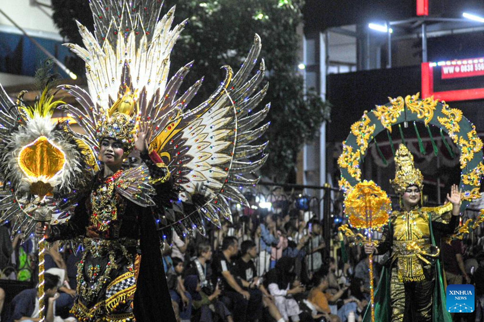 Performers take part in the Surabaya Vaganza 2026 in Surabaya, East Java province, Indonesia on May 16, 2026. Themed Garden of Hope, the Surabaya Vaganza 2026 presented decorated floats, light displays and cultural performances to showcase local culture and positive spirits in Surabaya. (Photo by Sahlan Kurniawan/Xinhua)


