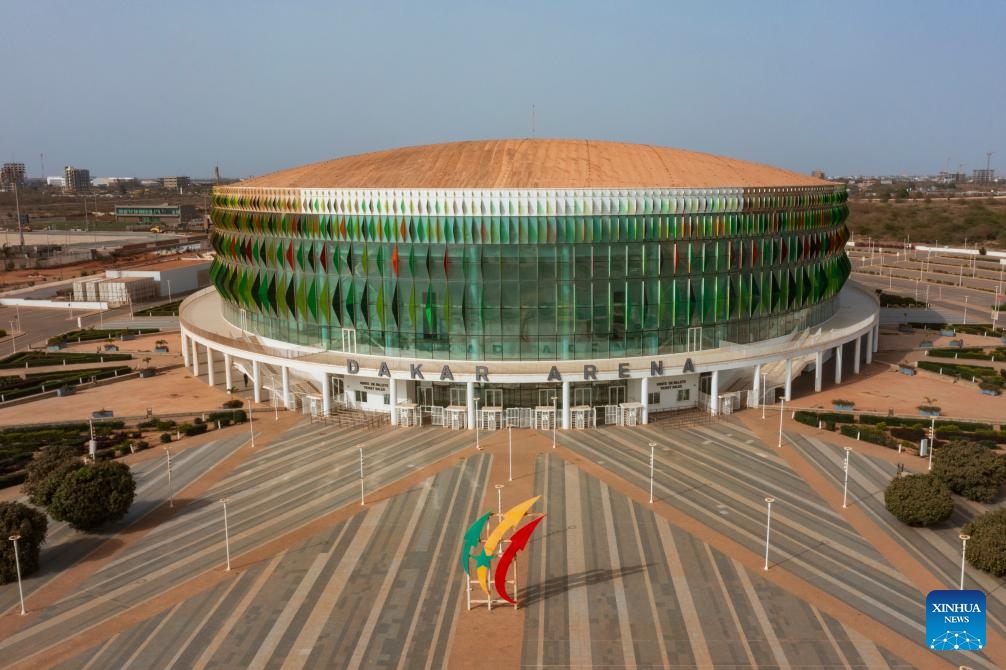 An aerial drone photo taken on May 17, 2026 shows an external view of Dakar Arena, which will host badminton and futsal event during the Dakar 2026 Youth Olympic Games, in Diamniadio, Senegal. With less than six months to go before the opening of the Dakar 2026 Youth Olympic Games, preparations have entered the final sprint stage. The Games will be held in three locations in Senegal - Dakar, Diamniadio and Saly. (Photo: Xinhua)