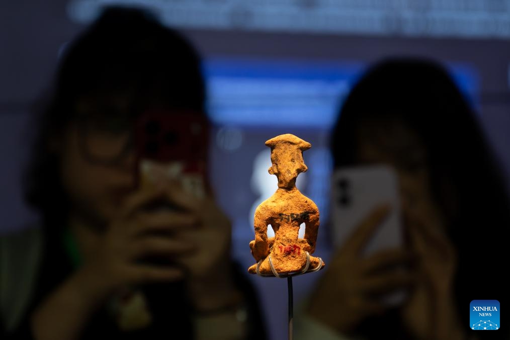 Visitors take photos at the museum of the Shijiahe site, the ruins of a prehistoric city, in Shijiahe Town of Tianmen City, central China's Hubei Province, May 18, 2026. The museum will open to the public on Tuesday. (Photo: Xinhua)