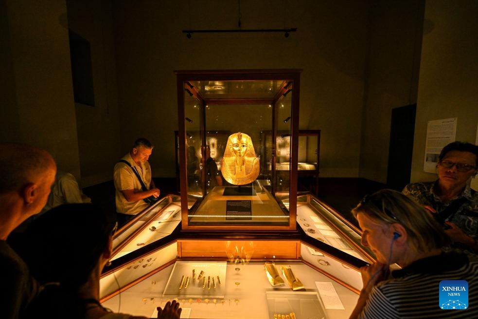 Visitors view the Funerary Mask of King Psusennes I at the Egyptian Museum in Cairo, Egypt, May 17, 2026. May 18 marks International Museum Day. Visitors have flocked to museums across the country in recent days to feel the unique charm of ancient Egyptian civilization. (Photo: Xinhua)