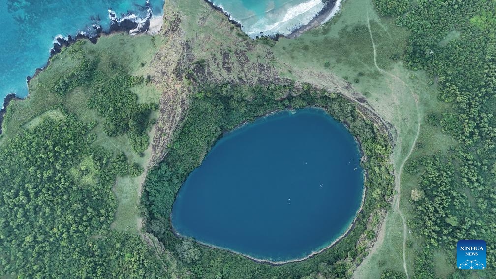 An aerial drone photo taken on May 15, 2026 shows a volcanic crater lake in Moroni, capital of the Comoros. The Comoros is an archipelagic nation in the Indian Ocean off the southeastern coast of Africa, situated at the northern end of the Mozambique Channel between Mozambique and Madagascar. (Photo: Xinhua)