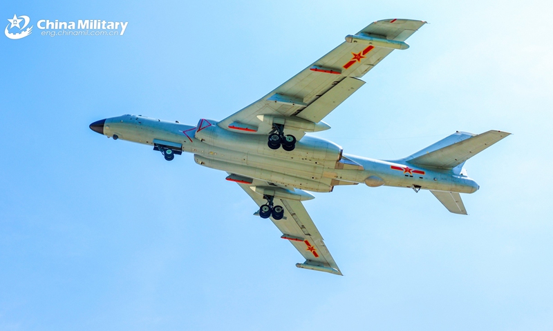 An H-6J bomber attached to an aviation regiment under the Chinese PLA Air Force flies towards the designated airspace for a round-the-clock raining exercise in early May, 2026. (Photo: eng.chinamil.com.cn)