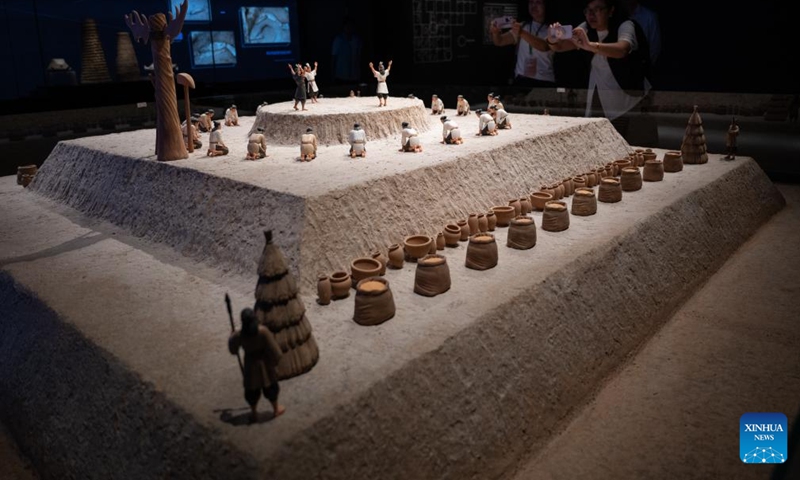 Visitors take photos at the museum of the Shijiahe site, the ruins of a prehistoric city, in Shijiahe Town of Tianmen City, central China's Hubei Province, May 18, 2026. The museum will open to the public on Tuesday. (Photo: Xinhua)