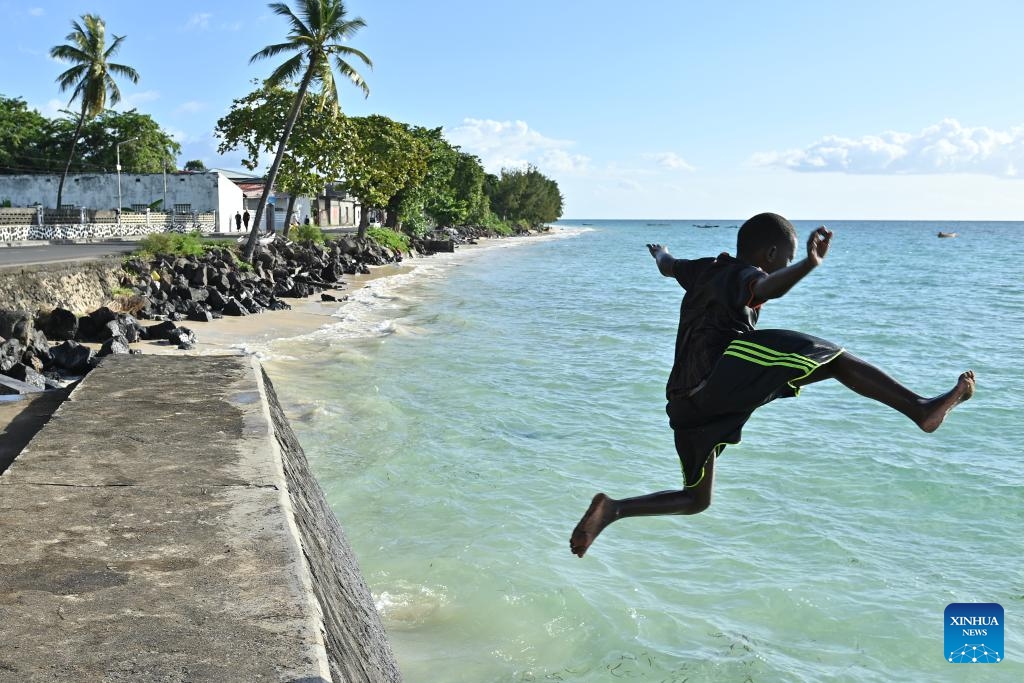 A child dives into the sea in Moroni, capital of the Comoros, May 15, 2026. The Comoros is an archipelagic nation in the Indian Ocean off the southeastern coast of Africa, situated at the northern end of the Mozambique Channel between Mozambique and Madagascar. (Photo: Xinhua)