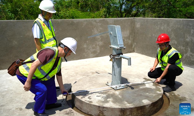 Chinese technicians carry out a routine inspection of a China-aided water well in Bato Losso village, Plateaux Region, Togo, on April 15, 2026. (Photo: Xinhua)