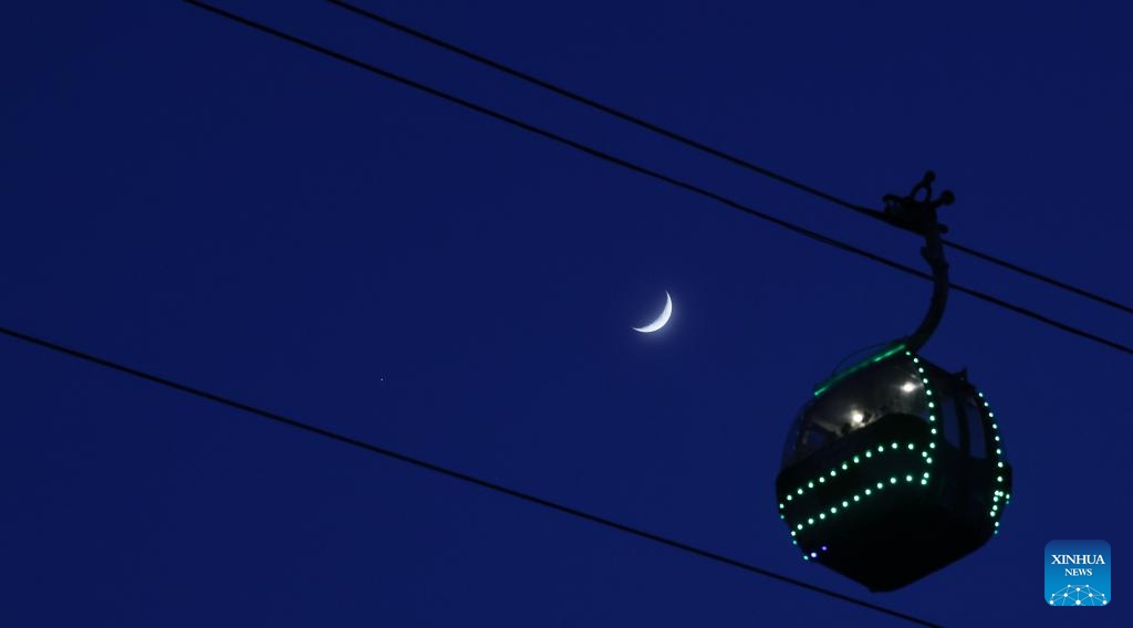 This photo taken on May 20, 2026 shows the planet of Jupiter next to the moon in the sky over Shuangyashan City, northeast China's Heilongjiang Province. (Photo: Xinhua)