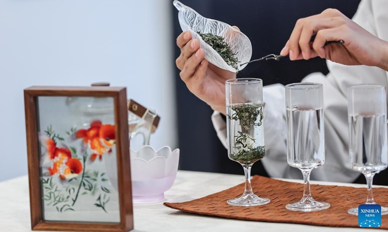 A tea master demonstrates tea brewing during a Chinese tea cultural event in Budapest, Hungary, on May 19, 2026. A Chinese tea cultural event themed Tea: The Taste of Harmony was held Tuesday in Budapest to promote cultural exchanges between China and Hungary through traditional tea ceremonies and artistic performances. (Photo: Xinhua)