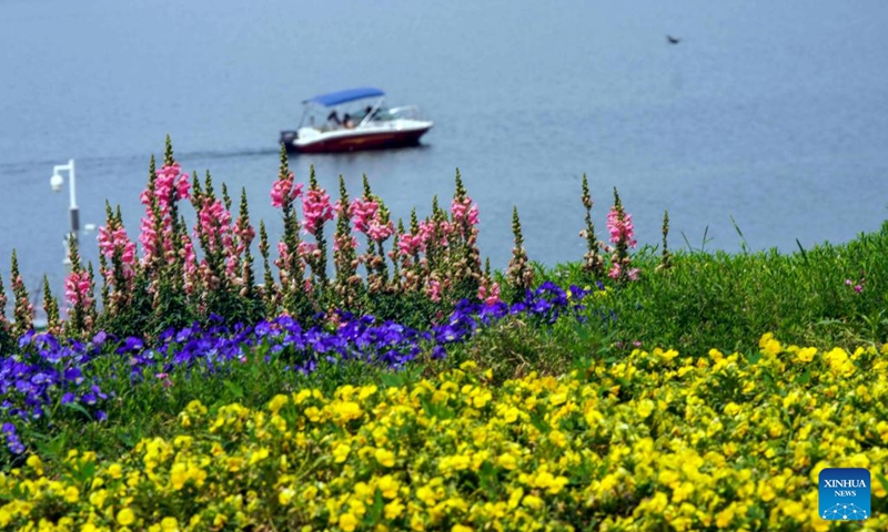 Tourists enjoy scenery by boat at a scenic spot in Qianxi County, north China's Hebei Province, May 19, 2026. This Tuesday marks the 16th China Tourism Day. (Photo: Xinhua)