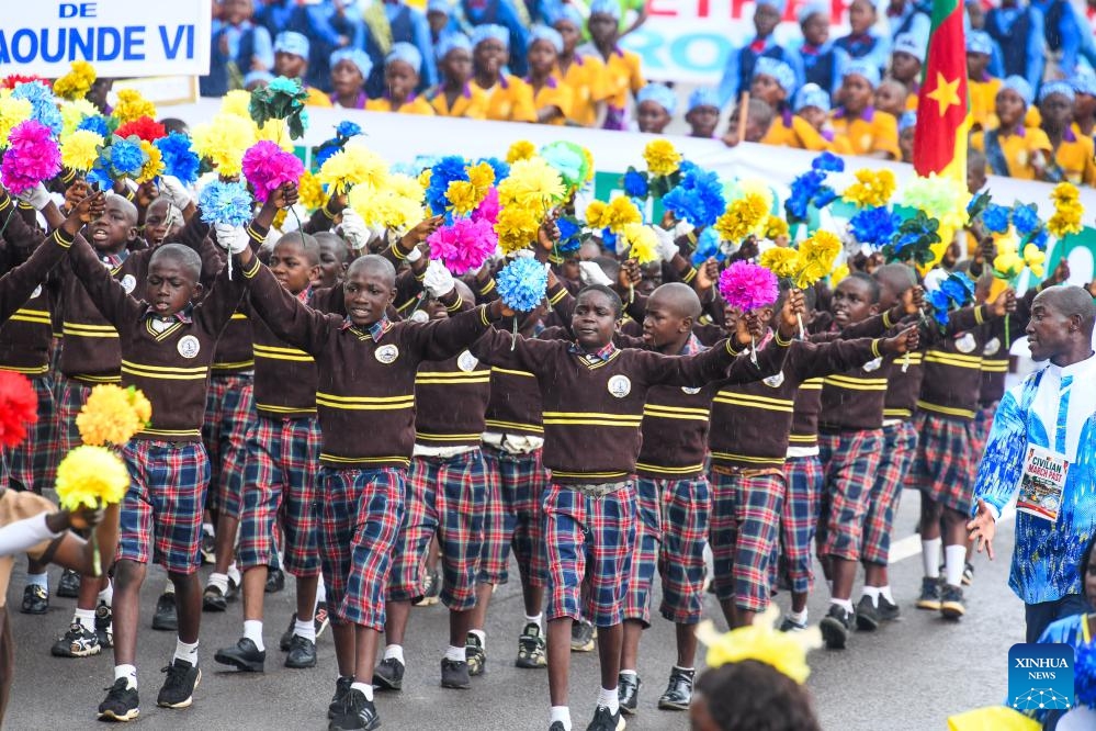 Primary school students march during the National Day celebrations in Yaounde, Cameroon, on May 20, 2026. Cameroon on Wednesday marked the 54th anniversary of its National Day with military and civilian parades held across the country. (Photo: Xinhua)