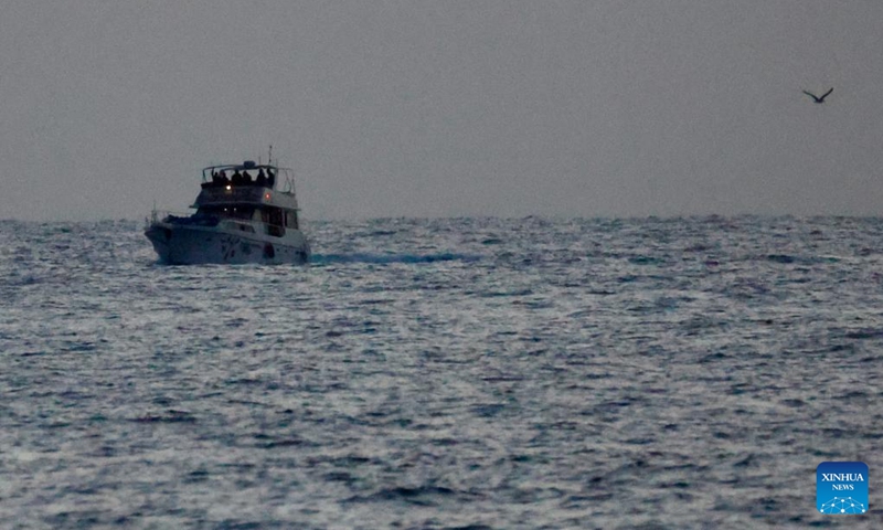 A boat of the Gaza-bound aid flotilla, after being intercepted by the Israeli navy, is escorted toward the Israeli port of Ashdod, Israel, on May 19, 2026. Israel said late Tuesday that it had intercepted all boats in a Gaza-bound aid flotilla, detaining hundreds of activists and transporting them to Israel. (Photo: Xinhua)