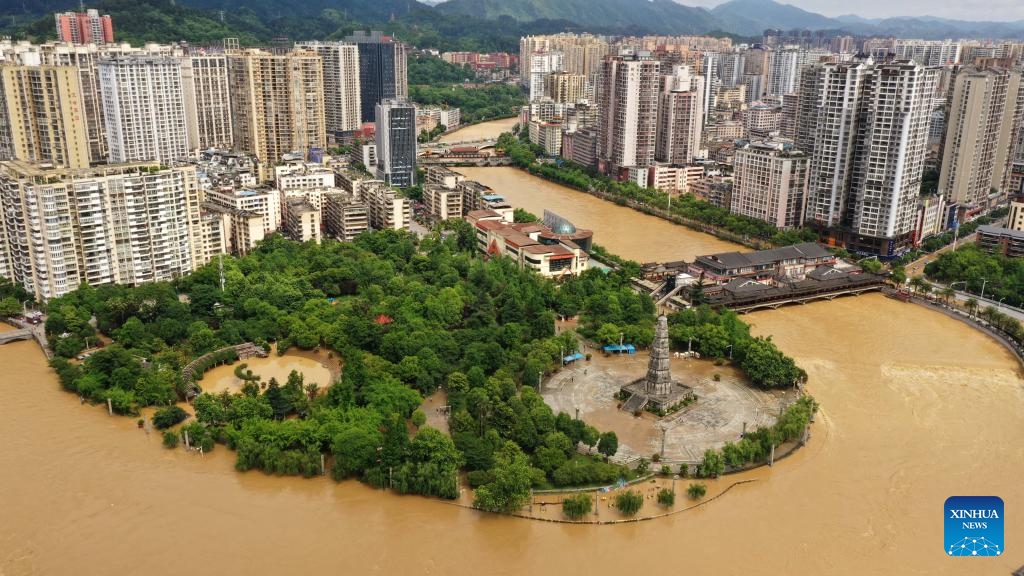 An aerial drone photo taken on May 19, 2026 shows the flooded Jianjiang River and a flood-hit area in Duyun City, southwest China's Guizhou Province. Heavy rains lashed Duyun City from 6 a.m. Monday to 6 a.m. Tuesday. Guizhou geological disaster prevention and control headquarters activated a Level III alert for geological disasters in the Qiandongnan, Qiannan and Qianxinan prefectures. (Photo: Xinhua)