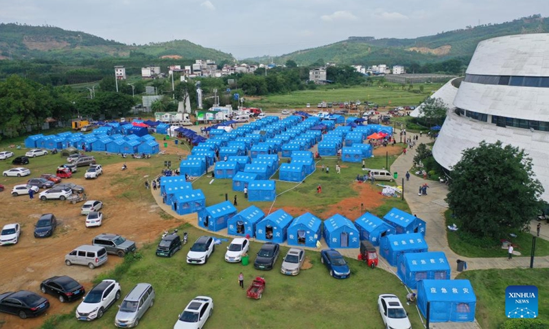 An aerial drone photo taken on May 19, 2026 shows a temporary relocation site in Liuzhou, south China's Guangxi Zhuang Autonomous Region. Two earthquakes of 5.2-magnitude struck Liuzhou City in quick succession, causing casualties and damaging buildings. Multiple temporary relocation sites have been set up with sufficient relief supplies and medical services for quake-affected residents. (Photo: Xinhua)