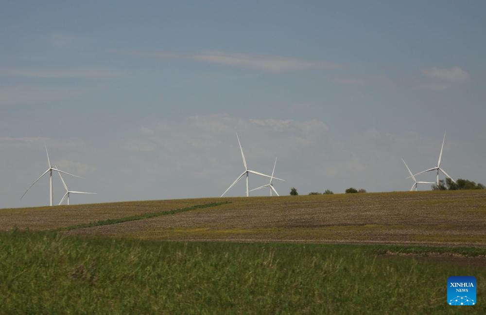 Photo taken on May 11, 2026 shows wind turbines at a wind farm near Bridgewater town, Iowa, the United States. U.S. state of Iowa has over 6,400 active wind turbines and wind farms generated 60% of Iowa's total electricity, making it a national leader in wind energy production. (Photo: Xinhua)