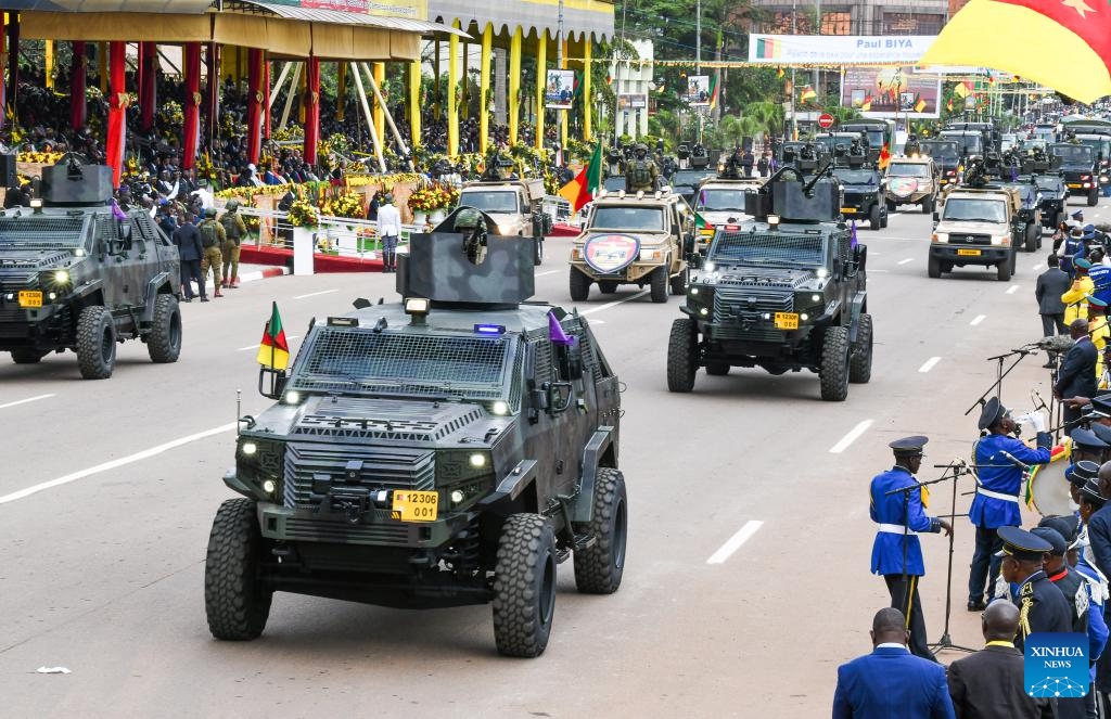 Military vehicles parade during the National Day celebrations in Yaounde, Cameroon, on May 20, 2026. Cameroon on Wednesday marked the 54th anniversary of its National Day with military and civilian parades held across the country. (Photo: Xinhua)