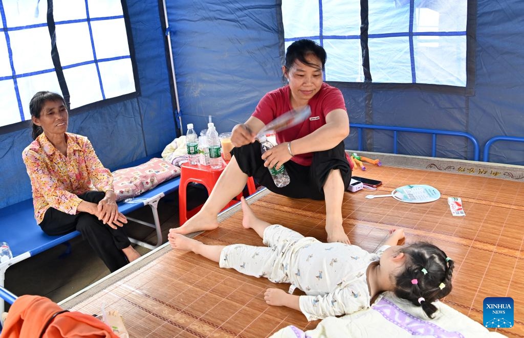 Earthquake-affected residents are pictured inside a tent at a temporary relocation site in Liuzhou, south China's Guangxi Zhuang Autonomous Region, May 19, 2026. Two earthquakes of 5.2-magnitude struck Liuzhou City in quick succession, causing casualties and damaging buildings. Multiple temporary relocation sites have been set up with sufficient relief supplies and medical services for quake-affected residents. (Photo: Xinhua)