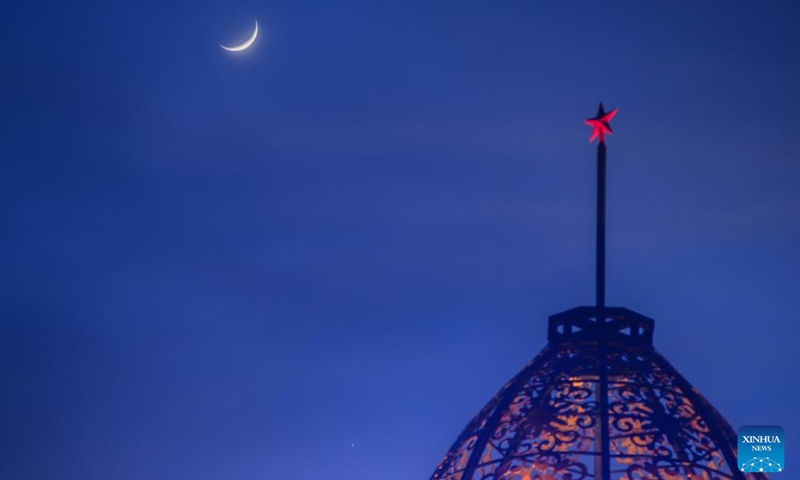 This photo taken on May 19, 2026 shows the planet of Venus next to the moon in the twilight sky over the Yabuli Ski Resort in Yabuli, northeast China's Heilongjiang Province. (Photo: Xinhua)