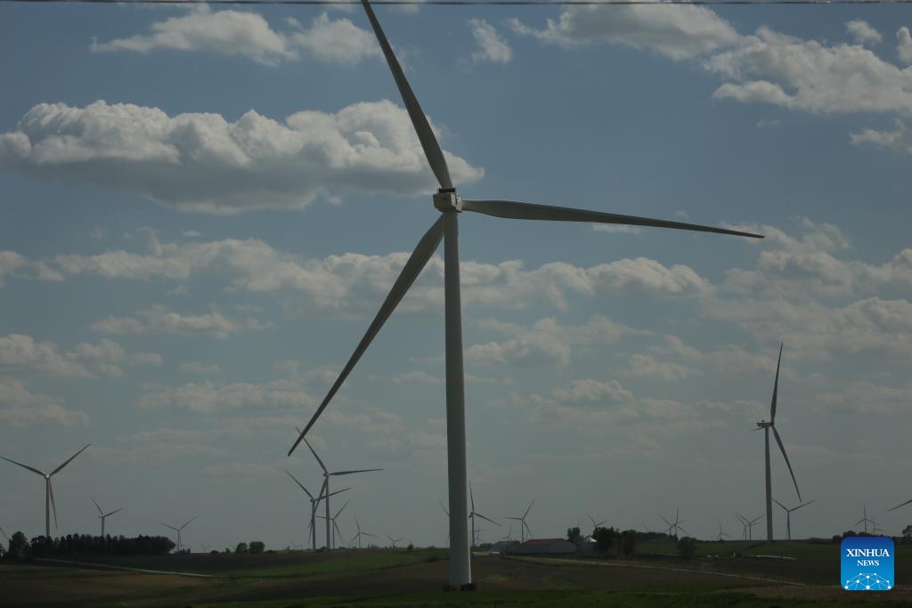 Photo taken on May 11, 2026 shows wind turbines at a wind farm near Bridgewater town, Iowa, the United States. U.S. state of Iowa has over 6,400 active wind turbines and wind farms generated 60% of Iowa's total electricity, making it a national leader in wind energy production. (Photo: Xinhua)