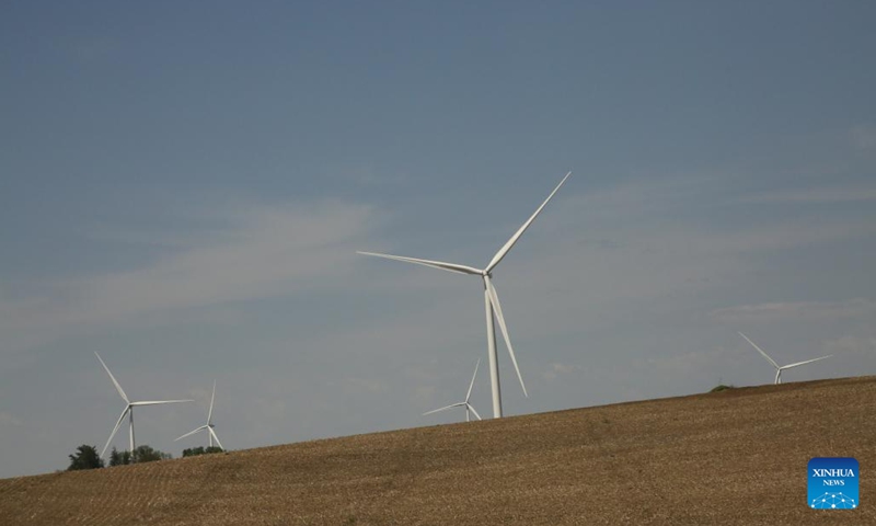 Photo taken on May 11, 2026 shows wind turbines at a wind farm near Bridgewater town, Iowa, the United States. U.S. state of Iowa has over 6,400 active wind turbines and wind farms generated 60% of Iowa's total electricity, making it a national leader in wind energy production. (Photo: Xinhua)