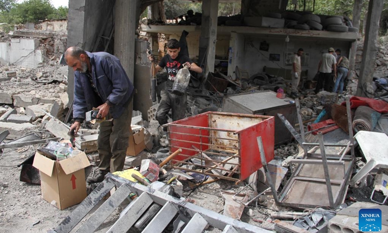People search for reusable items amid rubble of a building destroyed in an Israeli airstrike in the city of Nabatieh, southern Lebanon, May 19, 2026. On April 23, Washington said Israel and Lebanon agreed to extend the ceasefire by three weeks. On Friday, Washington said the two sides agreed to extend the ceasefire for another 45 days. Despite the truce, Israel has continued carrying out strikes in Lebanon, while Hezbollah has also launched attacks on northern Israel and Israeli military positions in southern Lebanon. (Photo: Xinhua)
